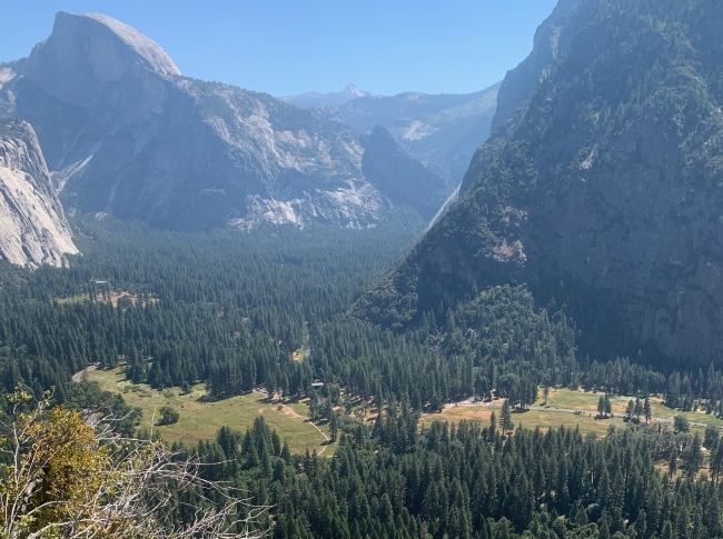 Half Dome, Glacier Point, and Yosemite mountain valley viewed from above during a hiking trip to Columbia Rock